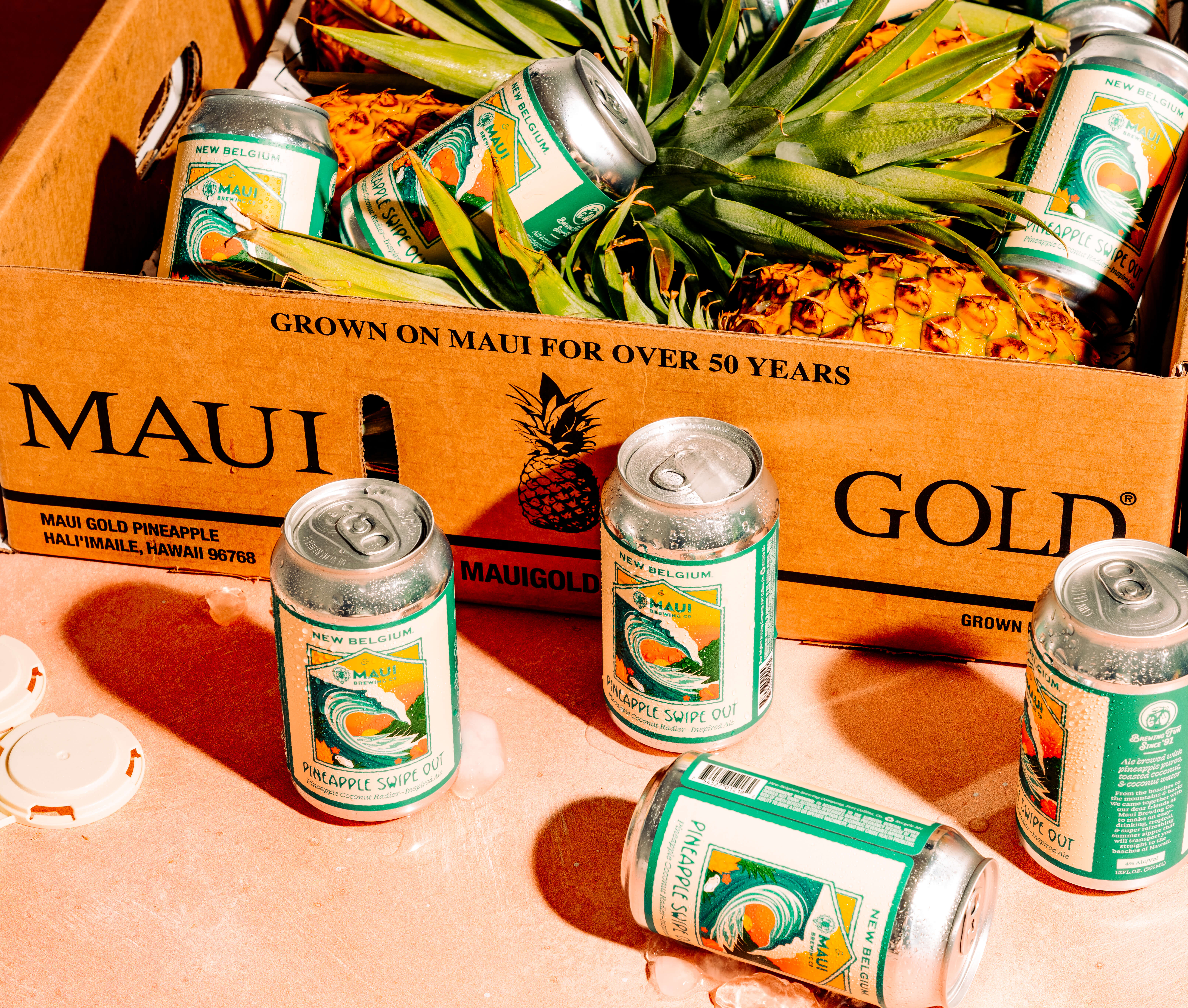 newbelgium maui brewing pineapple swipe out pineapples cans