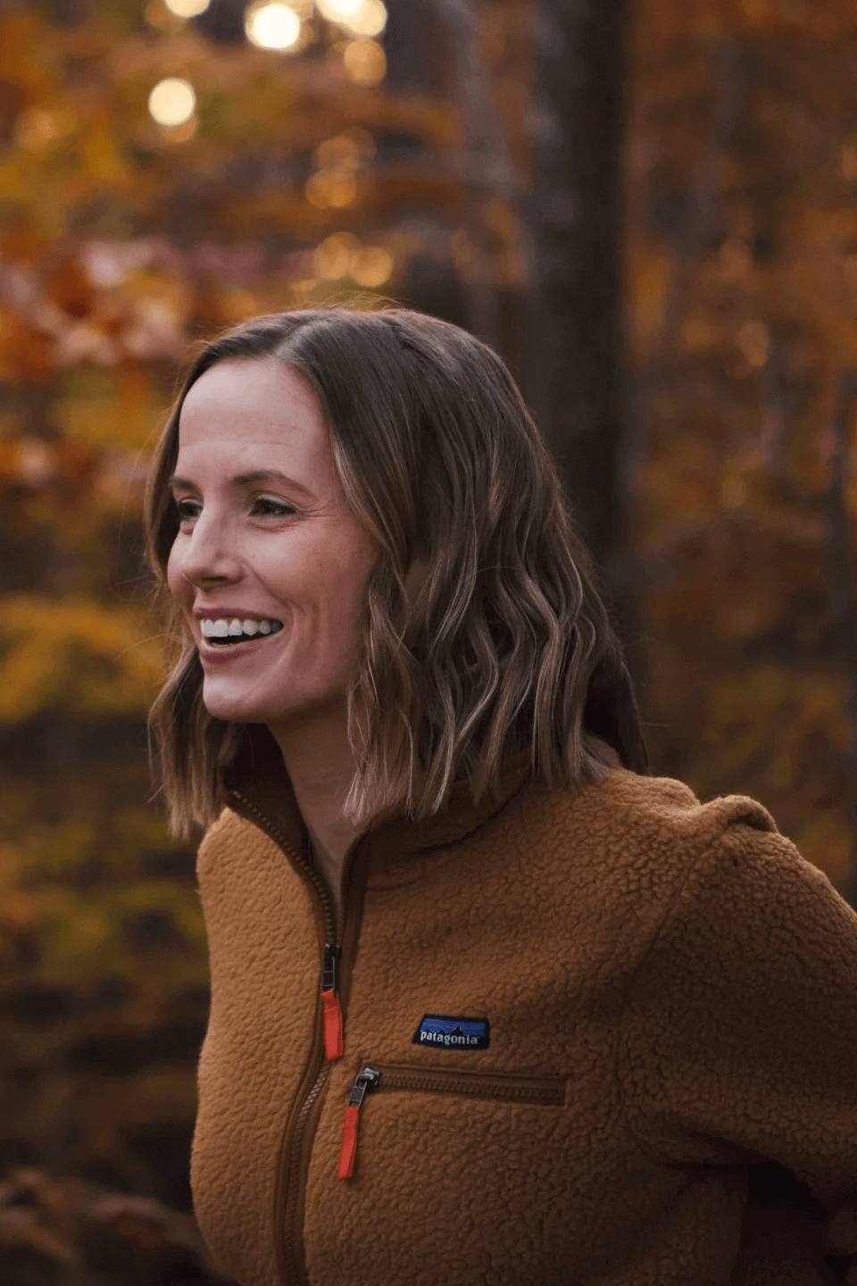 Amber Shares smiling in outdoor setting