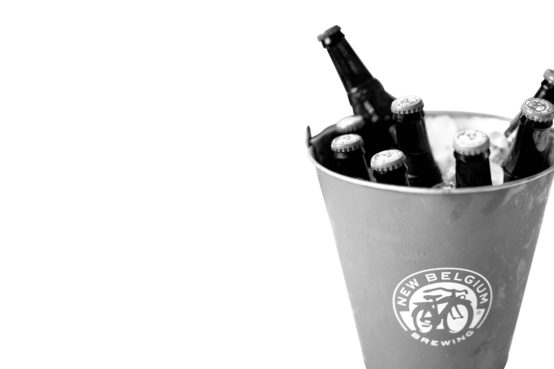A metal bucket filled with beer bottles