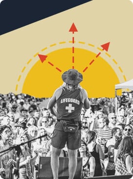 New Belgium coworker on stage speaking to the crowd at Tour de Fat. 